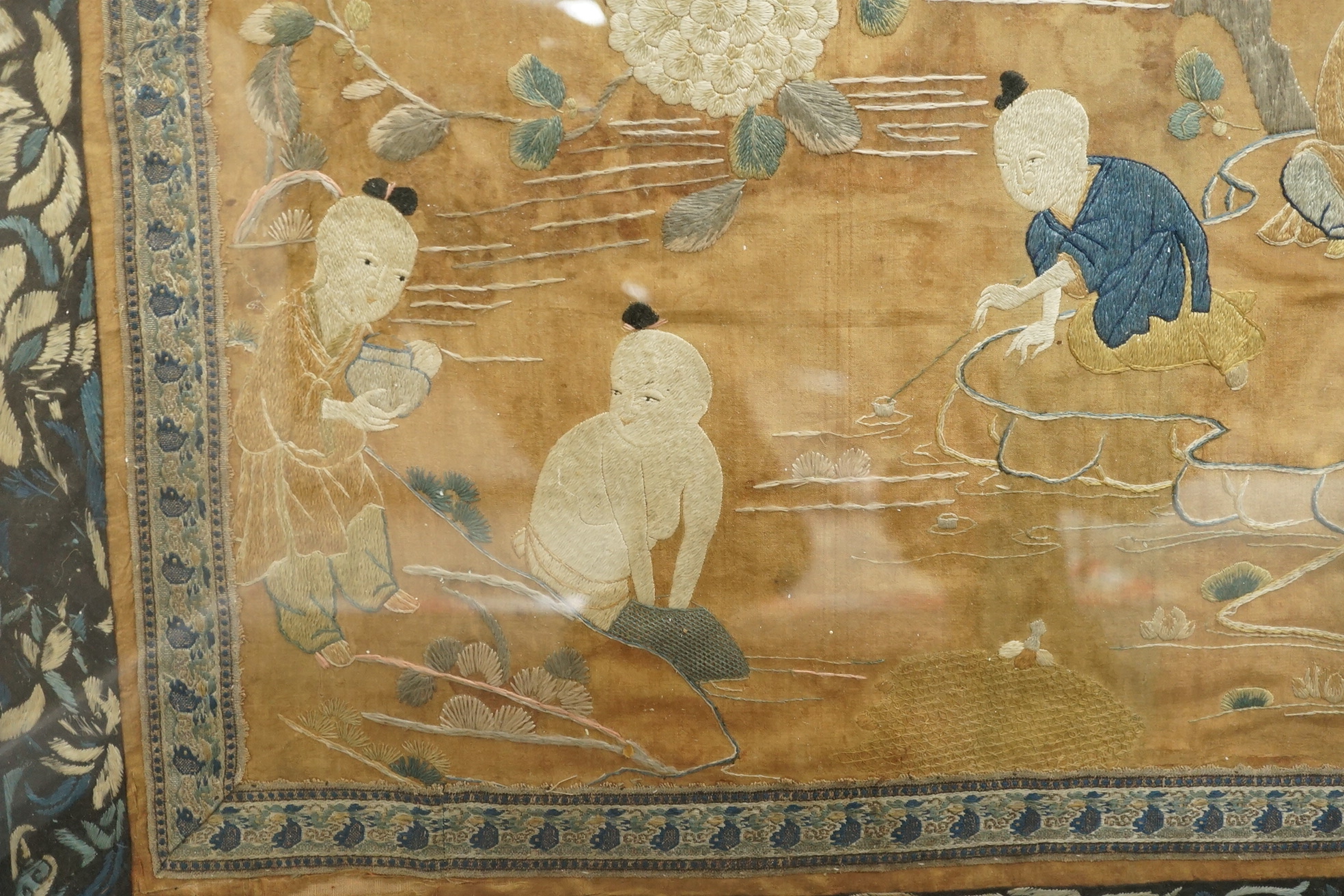 A large Chinese embroidered silk 'boys' panel, 19th century